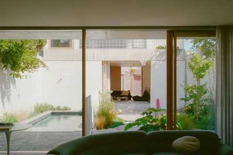 It’s Made From Glass Bricks, But Their Backyard Studio Is Anything But ’80s