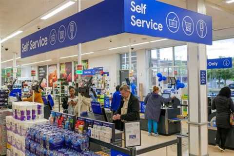 Tesco raises profit forecast and lifts share buyback to £950m