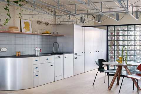 The Loft in This Madrid Flat Hangs From the Ceiling With a Metal Truss