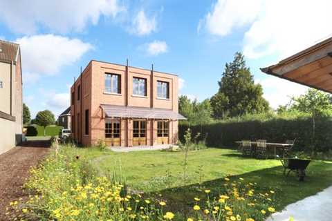 The Interior of This Brick Home in Belgium Takes an Unexpected Turn